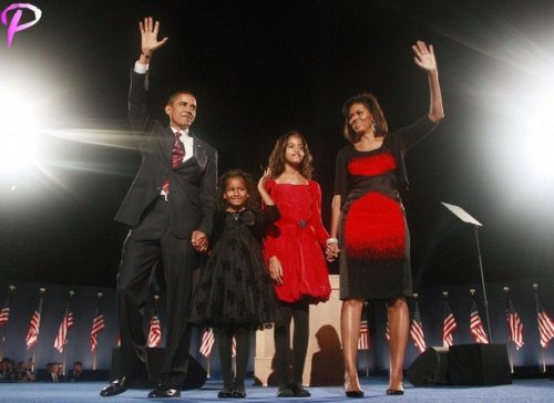 U.S. President-elect Senator Barack Obama (D-IL) along with wife Michelle (R) and daughters Sasha and Malia (2nd R) wave during his election night victory rally in Chicago November 4, 2008. Obama captured the White House on Tuesday after an extraordinary two-year campaign, defeating Republican John McCain to make history as the first black to be elected U.S. president.