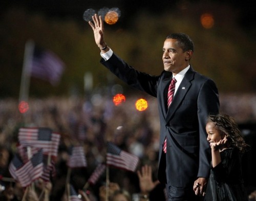 U.S. President-elect Senator Barack Obama (D-IL) waves with his daughter Sasha as he comes onto stage holding her hand to speak to supporters during his election night rally after being declared the winner of the 2008 U.S. Presidential Campaign in Chicago, November 4, 2008.