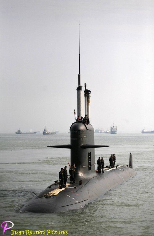 Malaysia's first submarine, "KD Tunku Abdul Rahman", decks in Port Klang outside Kuala Lumpur September 3, 2009. The French-made "KD Tunku Abdul Rahman", the first of the two Scorpene-class diesel-electric submarines ordered by the Malaysian Navy, made a port call on Thursday in Port Klang for a welcoming ceremony on its maiden voyage from Toulon in France to Sepanggar in east Malaysia. The "KD Tunku Abdul Rahman" was named after the Malaysian first Prime Minister Tunku Abdul Rahman Putra Al-Haj.